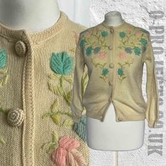 "Vintage 1950s/1960s knitted cream cardigan with floral embroidery, beautiful self covered buttons, 8/10/12 Label says 16 / 40 but I would say it's definitely smaller than this in modern sizes! Please check measurements as it depends how you prefer the fit. *Faint mark on back of sleeve (see photo) Embroidery is quite chunky and in green, lime, lemon, pink and blue. Ribbed cuffs and hem. Neckband is a rib type bind that looks linked on? Fully fashioned armhole Item has been laundered and is ready to wear! Photographed on a size 10/12  dummy. MEASUREMENTS ALL APPROXIMATE: Pit to pit: 18 1/2\" Hem at back: 15\" Length: 21\" Side seam length: 13\" Shoulder to shoulder: 14\" Sleeve length: 20\" Cuff flat: 2 1/2\"  Pulls to about 3 1/2\" Any questions, extra measurements or photos required -  p Cream Floral Embroidery Cardigan For Spring, Cream Floral Embroidered Cardigan For Spring, Vintage Cream Sweater With Floral Embroidery, Vintage Floral Embroidered Sweater For Spring, Vintage Floral Embroidered Long Sleeve Cardigan, Cream Cardigan With Buttons For Spring, Vintage Embroidered Cream Cardigan, Vintage Embroidered Sweater For Spring, Vintage Cream Embroidered Cardigan