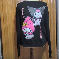 My Melody Kuromi Sanrio Black Sweatshirt Graphics On Front And Back Super Soft And Cozy Perfect Gift Anytime Please Note There Is A Slight Imprrfection On Print On Kuromi, Size Large. See Pic Kawaii Hello Kitty Print Crew Neck Top, Harajuku Style Black Top With Cartoon Print, Harajuku Hello Kitty Crew Neck Top, Kawaii Black Sweatshirt With Graphic Print, Pink Kawaii Top With Cat Print, Black Kawaii Sweatshirt With Graphic Print, Kawaii Long Sleeve Tops With Cat Print, Kawaii Black Top With Character Print, Kawaii Long Sleeve Cat Print Top