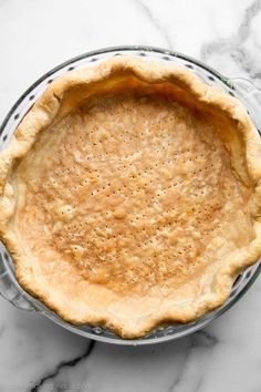 an uncooked pie sitting on top of a table