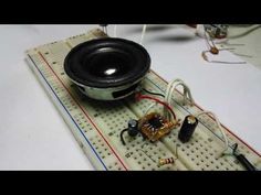 an electronic device with a speaker built into it's board and wires connected to the speakers