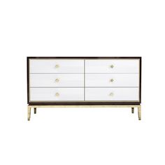 a white dresser with gold handles and drawers on the bottom, against a white background