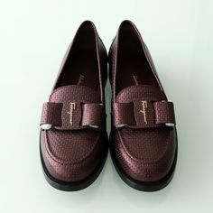 These Stylish Ferragamo Women Loafers In A Vibrant Purple Color Are A Must-Have Addition To Any Woman's Shoe Collection. Crafted From High-Quality Leather, These Flat Loafers Are Not Only Comfortable But Also Exude A Sense Of Sophistication And Elegance. Perfect For Both Casual And Formal Occasions, These Shoes Are Versatile And Can Easily Elevate Any Outfit. Whether You're Running Errands Or Heading To A Meeting, These Ferragamo Loafers Are Sure To Make A Statement And Leave A Lasting Impressio Elegant Tassel Loafers With Textured Sole And Almond Toe, Elegant Office Tassel Loafers With Textured Sole, Luxury Tassel Loafers With Rubber Sole For Galas, Luxury Tassel Loafers With Textured Sole And Round Toe, Designer Calf Leather Loafers For Galas, Luxury Calf Leather Moccasins For Office, Elegant Moccasins With Textured Sole And Almond Toe, Elegant Brown Tassel Loafers With Flat Heel, Elegant Flat Oxfords For Work