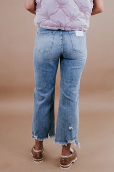 Achieve a chic look with our Casey Cropped High Waisted Straight Leg Jeans in a trendy light wash from RISEN. These stylish jeans feature a flattering high waist and a cropped length, making them a versatile and on-trend addition to your wardrobe. Fit: We suggest sizing down one size from your typical denim size in this style. Light wash Distressed bottoms Cropped look Button + zip closure RISE: 11' INSEAM: 26' in a size 3 RISE: 14" INSEAM: 26" in size 1XL 95% cotton 3.5% rayon 1.5% spandex Mode High Waist Distressed Light Wash Cropped Jeans, High Waist Light Wash Rigid Denim Cropped Jeans, Casual Light Wash Non-stretch Cropped Jeans, Straight Light Wash Cropped Rigid Denim Jeans, Non-stretch High Rise Cropped Jeans, High Waisted Straight Leg Jeans, Jeans Light Wash, Comfy Jeans, Stylish Jeans