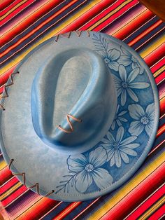 Handmade Blue Hat Bands With Curved Brim, Handmade Blue Fedora With Curved Brim, Blue Artisan Hat With Flat Brim, Artisan Blue Hat With Flat Brim, Artisan Blue Flat Brim Hat, Artisan Blue Brimmed Hat, Artisan Blue Flat Brim Fedora, Artisan Blue Fedora Hats, Artisan Blue Wide Brim Hat