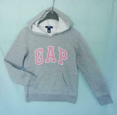 GAP Kids Girls Arch Logo Heather Gray Hoodie Sweatshirt , L 10-11 YRS GAP Kids Girls Arch Logo Heather Gray Hoodie Sweatshirt , L 10-11 YRS Click images to enlarge Description   Designer : GAP Kids Size : L(10-11YRS) Color : Heather gray Fabric : 77% Cotton ~ 23% Polyester Description : ~Soft, comfy fleece. ~Long sleeves with ribbed cuffs, hem. ~Hood. ~Embroidered arch logo applique at front. ~Kanga pocket.   Care : Machine wash. Measurements : Chest --16"/ 41cm across Center back length -- 20.5 Hello Kitty Sweatshirt, Gap Hoodie, Vision Street Wear, Arch Logo, Nike Pullover, Gray Hoodie, Gray Fabric, Gap Kids, Pink Hoodie