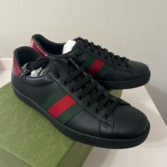 Brand New Men Gucci Sneaker Gucci Size 7=8us Authentic, Brand New Condition Business Low-top Sneakers With Red Sole, Luxury Black Slip-on Sneakers, Gucci Leather Sneakers With Red Sole, Gucci Black Sneakers With Contrast Sole, Gucci Leather Slip-on Sneakers, Designer Black Sneakers With Round Toe, Black Luxury Slip-on Sneakers, Gucci Black Low-top Sneakers, Gucci Black Leather Sneakers