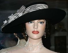 "Indulge in the allure of vintage-inspired fashion and make a statement with the enchanting \"Lady Olivia\" hat by East Angel Harbor Hats, designed by the talented Darna. This stylish Edwardian tea hat is a true masterpiece, with its oval-shaped black wool base that exudes a sense of timeless elegance. The hat band and bow, expertly crafted from narrow charcoal white striped silk taffeta, add a touch of refinement and sophistication. Adorned with graceful gray organza roses and delicate satin le Evening Hat, Tea Hat, Edwardian Hat, Tea Hats, Ascot Hats, Women Hats Fashion, Olivia Black, Vintage Inspired Fashion, Kentucky Derby Hat