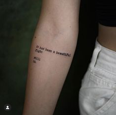 a person with a tattoo on their arm that says it has been a beautiful day