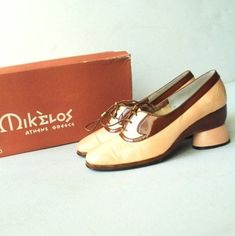 "Wearable art vintage 70s, cream- brown patent leather oxford style , sculptured , rounded heel, high fashion, hand made shoes by Mikelos, Athens collection. With the original box. Showstopping. Gently used condition. Clean and strong inside and out. No discoloration ,no odor. The shoes ( please see the photo) have a stiff leather on the back , look like a crinkle.But it's not noticeable. The glossy brown leather and leather shoelace in the excellent condition. Size 7AA. Length of the insole:9,5 Retro Formal Oxfords, Retro Brogue Detailing Closed Toe Oxfords, Retro Brogue Oxfords With Closed Toe, Retro Leather Oxfords With Pointed Toe, Retro Oxfords With Brogue Detailing And Almond Toe, Retro Almond Toe Oxfords With Brogue Detailing, Retro Oxfords With Brogue Detailing, Retro Brown Leather Oxfords, Retro Brown Almond Toe Oxfords