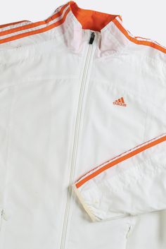 Sourced in Canada MeasurementsSize: LPit to Pit: 26.5"Arm: 26.5"Length: 29.5"Condition: Good vintage condition, minor stain on frontMaterial Composition: 100% polyesterColour: White, orange Orange Sporty Windbreaker For Sports, Orange Sporty Windbreaker, Adidas Hooded Moisture-wicking Windbreaker, Yellow Vintage Long Sleeve Windbreaker, Vintage Multicolor Windbreaker With Pockets, Adidas Windbreaker, Vintage Adidas, Windbreaker Jacket, Jacket Sale