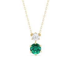 Take your styling game up a notch with this emerald and diamond necklace that is ready to inject luxe into any outfit. This necklace features two round diamonds mounted on a six-prong setting. With a versatile design, this sparkler is definitely something you can wear forever. Green Necklace With Prong Setting, Emerald Pendant Necklace With Diamond Prong Setting, Elegant Round Emerald Necklace With Vvs Clarity, Elegant Green Necklace With Vvs Clarity, Emerald And Diamond Necklace, Eternity Ring Diamond, Fancy Color Diamonds, High Jewelry, Personalized Necklace