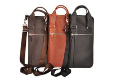 three different types of leather bags with straps