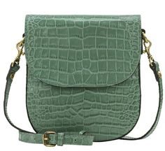 Patricia Nash Perrone Croco Embossed Leather Crossbody Bag-Sage Green-NWT                 HAS ORIGINAL TAG & DUST BAG Patricia Nash Perrone Leather Crossbody This structured crossbody is finished with signature Patricia Nash style from its gorgeous leather to its detailed designs. Equally reliable and beautiful, it's the perfect bag to take you from work, to evenings out, to weekends on the go and beyond. Color: Sage Green Croc Walls: Croco-embossed leather or haircalf Size/Profile: Small, structured crossbody Handle/Strap: Adjustable crossbody strap Embellishments: Embossed grape leaf logo Hardware: brass tone Top Closure: Magnetic snap flap Lining: Faux suede velvety fabric Exterior: 1 slip pocket Interior: 1 side zip pocket, 2 slip pockets Size & Content Measurements: Approx. 7.25"L x 2 Green Textured Leather Bag For Errands, Green Textured Leather Shoulder Bag For Errands, Green Textured Leather Bag For On-the-go, Green Crossbody Saddle Bag With Adjustable Strap, Green Crossbody Saddle Bag For Everyday Use, Green Textured Leather Crossbody Satchel, Green Saddle Bag With Adjustable Strap, Green Crossbody Saddle Bag With Removable Pouch, Green Travel Saddle Bag With Removable Pouch