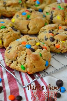 chocolate chip cookies on a cooling rack with candy