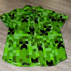 New Never Worn. Boys Size 4 Minecraft Button Down Shirt, Short Sleeve. Button Down Shirt Short Sleeve, Shirt Short Sleeve, Shirt Color, Black Green, Kids Shirts, Button Downs, Minecraft, Shirts Tops, Colorful Shirts