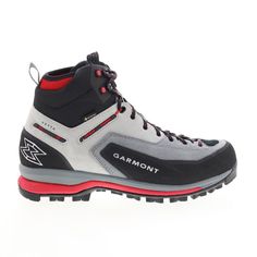 a pair of black and grey hiking shoes on a white background with red trimmings