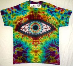 a tie dye shirt with an eye on it