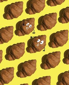 a group of brown croissants with faces drawn on them and eyes drawn down