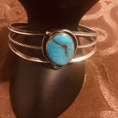 Vintage Navajo Sterling Silver Turquoise Cool Cuff Bracelet. Very Good Vintage Condition Adjustable Turquoise Sterling Silver Artisan Bracelet, Handmade Bohemian Blue Sterling Silver Bracelet, Artisan Adjustable Blue Sterling Silver Bracelet, Adjustable Bohemian Sterling Silver Oval Bracelet, Artisan Blue Sterling Silver Bracelets, Artisan Blue Sterling Silver Bracelet, Bohemian Blue Sterling Silver Bracelet With Natural Stones, Traditional Turquoise Hand Wrapped Jewelry, Adjustable Blue Oval Sterling Silver Bracelet