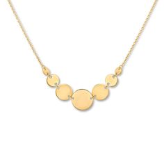 Round discs graduate in size from small to large in the center of this stylish necklace for her. Crafted of 14K yellow gold, the pendant suspends between an adjustable 16- to 18-inch cable chain that secures with a lobster clasp.