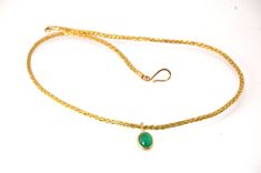 This clear emerald cabochon is bezel-set in 18k gold and suspended from a handmade woven chain of 18k gold in ancient Viking knit. A forged hook clasp finishes this simple and elegant design. Emerald Cabochon Pendant 9mm x15m Chain 19" long 18k gold, Emerald Cabochon One of a Kind Handmade Yellow Gold Necklace With Oval Cabochon, Yellow Gold Byzantine Jewelry With Box Chain, Byzantine Yellow Gold Jewelry With Box Chain, Gold Chain Necklaces, Emerald Cabochon, Viking Knit, Ancient Vikings, 18k Gold Chain, Woven Chain