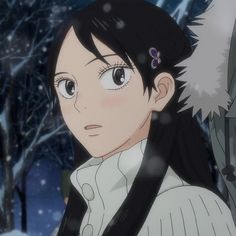 an anime character with long black hair standing in the snow