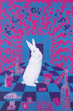 a white rabbit sitting on top of a blue and pink checkerboard pattern floor