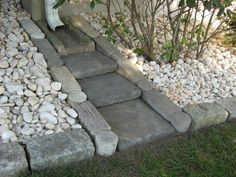 the steps are made out of rocks and gravel