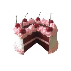 a piece of cake with pink frosting and cherries on top is cut in half