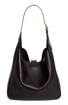 Signature T-shaped hardware adds a heritage touch to this slouchy hobo bag masterfully crafted in Italy from beautifully grained calfskin leather. Hook-tab closure Shoulder strap Leather Made in Italy Designer Handbags Classic Pebbled Leather Hobo Bag, Classic Calf Leather Hobo Bag With Smooth Grain, Classic Hobo Bag With Palladium Hardware For Work, Leather Hobo Bag With Metal Hardware For Business, Formal Pebbled Leather Hobo Bag, Classic Leather Hobo Bag With Metal Hardware, Classic Pebbled Leather Hobo Bag With Smooth Grain, Timeless Hobo Bag With Palladium Hardware, Luxury Hobo Bag For Work With Smooth Grain