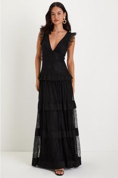 There's never been a look as chic and impressive as the Lulus Marvelous Darling Black Lace Ruffled Tiered Maxi Dress! Darling floral lace overlay shapes this lovely dress with a plunging V-neckline, seamed bodice, and dainty eyelash lace sleeves. Crochet lace trim adorns the set-in waist before falling to a ruffled, tiered maxi skirt with chiffon pleated details. A deep V-back completes the gorgeous look! Hidden back zipper/clasp. Fit: This garment fits true to size. Length: Floor length. Size m Wedding Guest Jacket Over Dress, Wedding Guest Jackets, Jacket Over Dress, Black Wedding Guest Dresses, Tiered Maxi Skirt, Fall Wedding Guest Dress, Black Bridesmaid Dresses, Black Lace Dress, Lace Ruffle