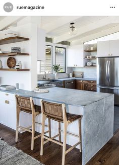 the kitchen is clean and ready to be used as a dining room or family room