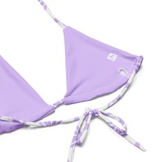 Indulge in the luxurious and exclusive style of our White Hawaiian Flowers on Lavender String Bikini. This beautiful string bikini set is not only comfortable, but it also offers double-layering and UPF 50+ protection. Customize the straps to your liking and get ready to turn heads at the beach! Made from soft recycled polyester, this bikini is both stylish and sustainable.• Soft and stretchy material with UPF 50+• Sizes up to 6XL• Bikini top comes with removable padding for comfort• Multiple wa Lavender Triangle Top Swimwear For Summer, Summer Lavender Swimwear For Swimming, Purple Beachwear Swimwear With Adjustable Straps, Lavender Summer Swimwear For Beach, Lavender Beachwear Swimwear For Beach Season, Lavender Summer Swimwear For The Beach, Summer Lavender Swimwear For The Beach, Purple Adjustable Straps Beachwear Swimwear, Purple Adjustable Straps Swimwear For Beach