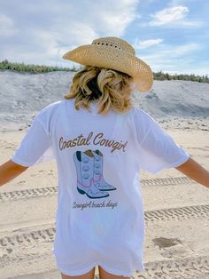 Coastal Cowgirl shirt, beach shirt, sunset shirt, trendy oversized shirt, summer shirt, summer beach shirt, gift for her, comfort colors tee  Hi, welcome to CCAPPARELTX! If you are looking for trendy lifestyle apparel for your best moments in life, then you have come to the right place. You can find comfortable and casual clothing that you can CUSTOMIZE, for you and your loved ones. We hope you enjoy your time at our shop, the processing time is currently 1-5 days. If you would like to rush your Coastal Cowgirl Tshirt, Beach Season Short Sleeve T-shirt For Day Out, Trendy Cotton Beach Camp Shirt, Trendy Cotton Camp Shirt For Beach, Summer Cotton Camp Shirt For Beach Season, Cotton Camp Shirt For Beach Season, Cotton Camp Shirt With Letter Print For Beach, Trendy Relaxed Fit Camp Shirt For The Beach, Trendy Camp Shirt With Graphic Print For Beach