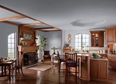 a kitchen and dining room with wood flooring