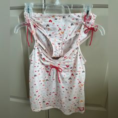 Calvin Klein 2 Piece Pajama Lingerie Set Pink Spaghetti Strap Camisole With Hearts Pretty Red Bow Design Adjustable Straps Camisole Maybe Worn Once Or Twice Brief Was Washed, Never Worn Size: M Runs Small, Would Fit A Size Small Sleeveless Camisole With Built-in Bra For Pajama Party, Red Sleeveless Cotton Sleepwear, Calvin Klein Cotton Tops For Loungewear, Calvin Klein Cotton Loungewear Tops, Fitted Camisole Tops For Sleepover, Fitted Sleeveless Tops For Sleepover, Red Sleeveless Top For Loungewear, Calvin Klein Summer Loungewear Tops, Calvin Klein Fitted Top For Loungewear