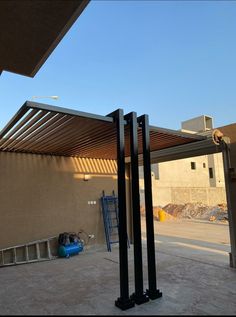 an empty parking lot next to a building under construction