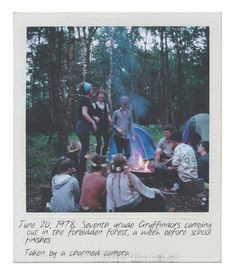 a group of people sitting around a campfire with the caption written below it