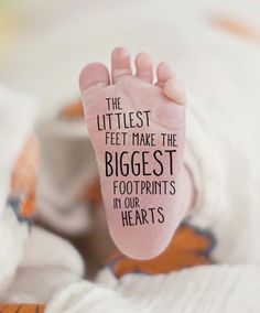 a person's foot with the words, the littlest feet make the biggest footprints in our hearts