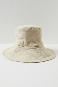 Perfect for outdoor adventures, this so classic bucket hat features a wide, floppy brim in a washed design and straps that tie under the chin. * Unstructured style * Adjustable fit | Lake Washed Bucket Hat by RAHI at Free People in Tan Outdoor Canvas Sun Hat With Curved Brim, Beach Canvas Wide Brim Bucket Hat, Natural Bucket Hat With Short Brim For Outdoor, Natural Bucket Hat With Curved Brim For Outdoor, Adjustable Canvas Sun Hat For Outdoor Use, Natural Short Brim Bucket Hat For Outdoor, Natural Curved Brim Bucket Hat For Outdoor, Outdoor Canvas Bucket Hat With Short Brim, Adjustable Brimmed Canvas Sun Hat