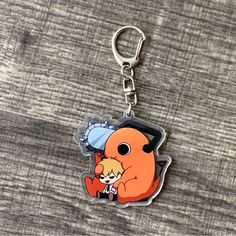 a keychain with an image of a cartoon character on it