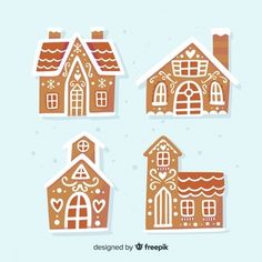 four gingerbread houses with snow on them