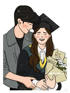 a man and woman hugging each other while wearing graduation caps