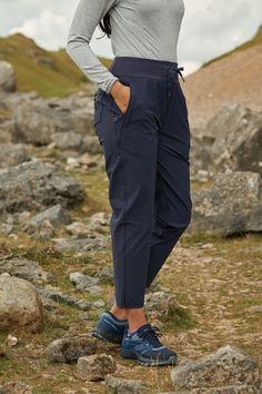 Discover ACAI’s latest women’s outdoor trousers; the Atlas Pants. Wanting to create something different to our bestselling leggings, jeans and skinny fit trousers, these pants have a luxe, jogger-style feel. Truly transitional wear, our designers had in mind you’d wear these on busy days when your outfit needs to move with you. Walk the dog, drop the kids off at school, take a seat at your WFH desk, and potter in the garden on your lunch break; whatever your day looks like, these relaxed fit, lightweight pants will keep you cool and comfy at every stage. Unlike our bestselling outdoor trousers, ACAI’s relaxed fit Atlas Pants have a tapered leg and draw cord waist. But ACAI’s hallmark features are included too; a high waist, shower resistant material, four-way stretch and of course, plenty Hiking Pants Outfit, Outdoor Outfits For Women, Walking Outfit Outdoor, Stylish Hiking Outfit, Wfh Desk, Best Hiking Pants, Walking Trousers, Hiking Pants Women, Walking Outfits