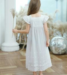 Keep your little one cool and comfortable on summer nights with our "Belle" Nightdress. Made of soft white cotton and featuring delicate broderie detailing. This nightdress is perfect for warmer weather. The short flutter sleeves add a touch of sweetness to this essential piece for any little girl's sleepwear collection. Item Type: Nightdress Material: Cotton Broderie Fit: Fits true to size, take your normal size Length: Mid-Calf Age Range: 3 Years-12 Years Girls Pyjamas, Girls Sleepwear, Flutter Sleeves, Soft White, Summer Nights, Flutter Sleeve, Night Dress, Mid Calf, White Cotton