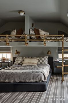 a large bed sitting under a metal shelf