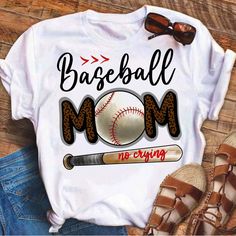 a baseball mom shirt with a bat and ball on it