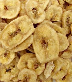 a pile of sliced bananas sitting on top of a table