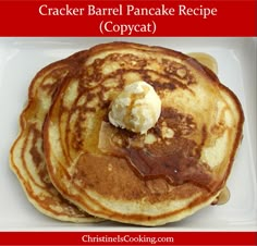 pancakes with butter and syrup on a white plate