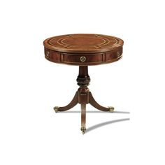 a small wooden table with an intricate design on the top